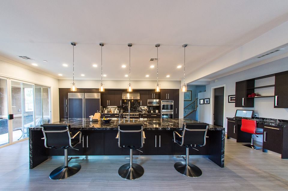 remodeled kitchen with marble island
